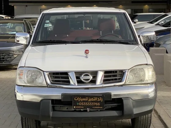 صورة نيسان ددسن غمارتين موديل 2015 نظيف